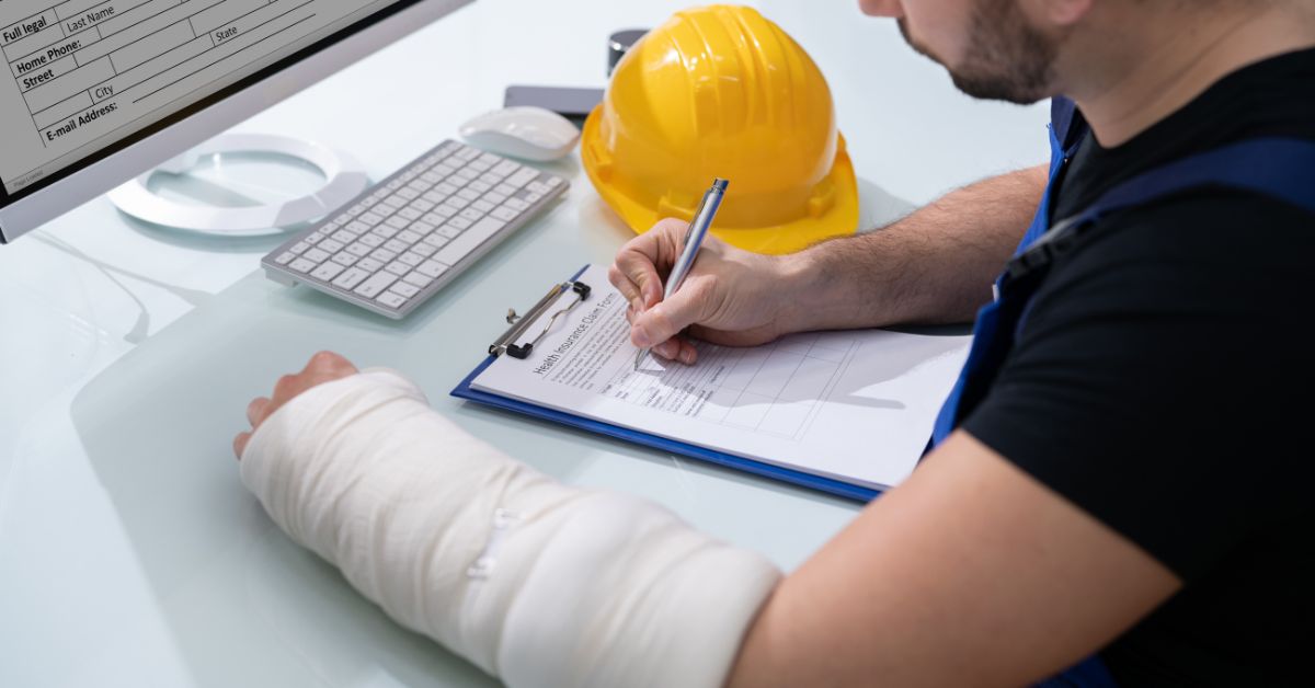 injured construction worker signing documents